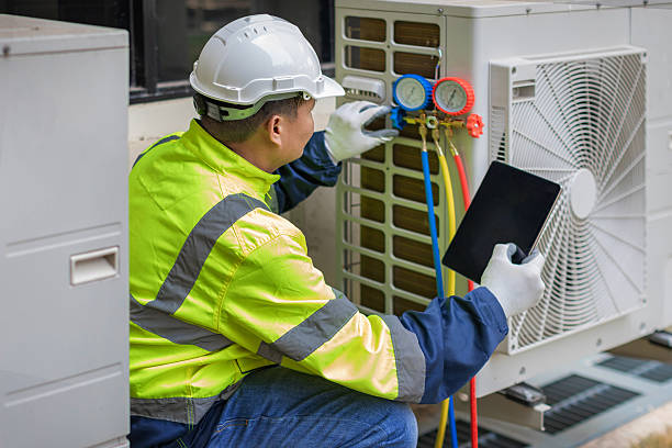 Professional Air Duct Cleaning technician working in Huntington, IN